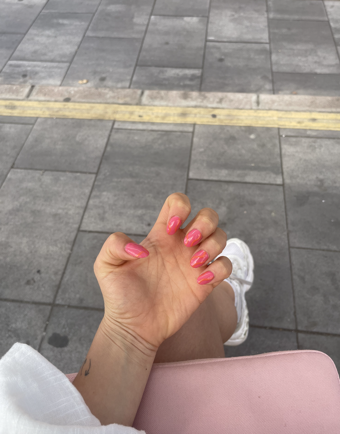 uñas rosas naranjas