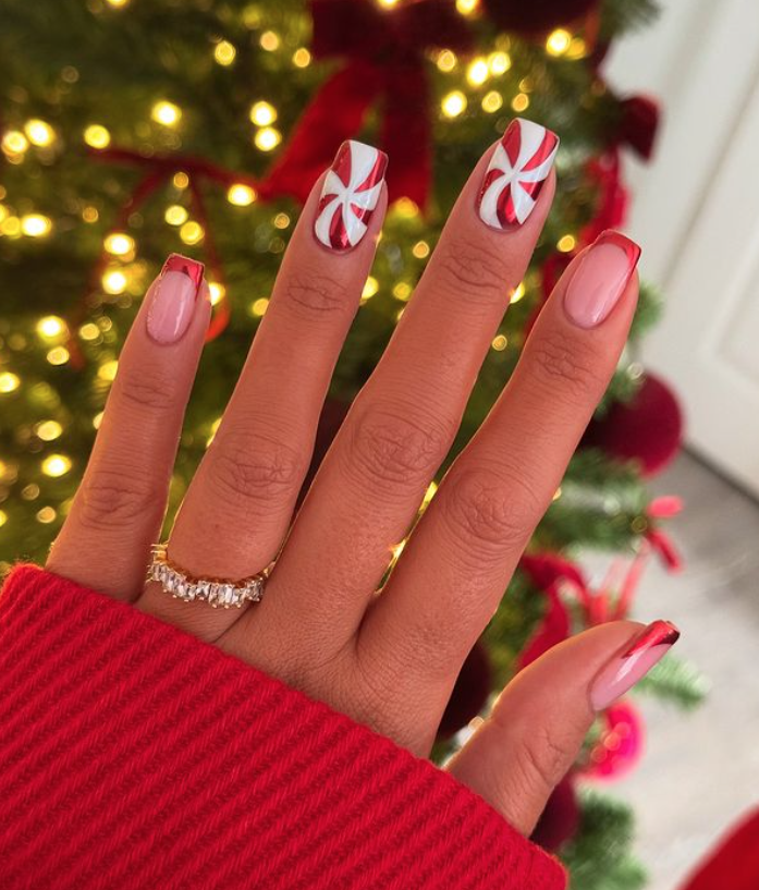 Manicura de bastones de caramelo en blanco y rojo - Imagen: beautyspace_charlotte