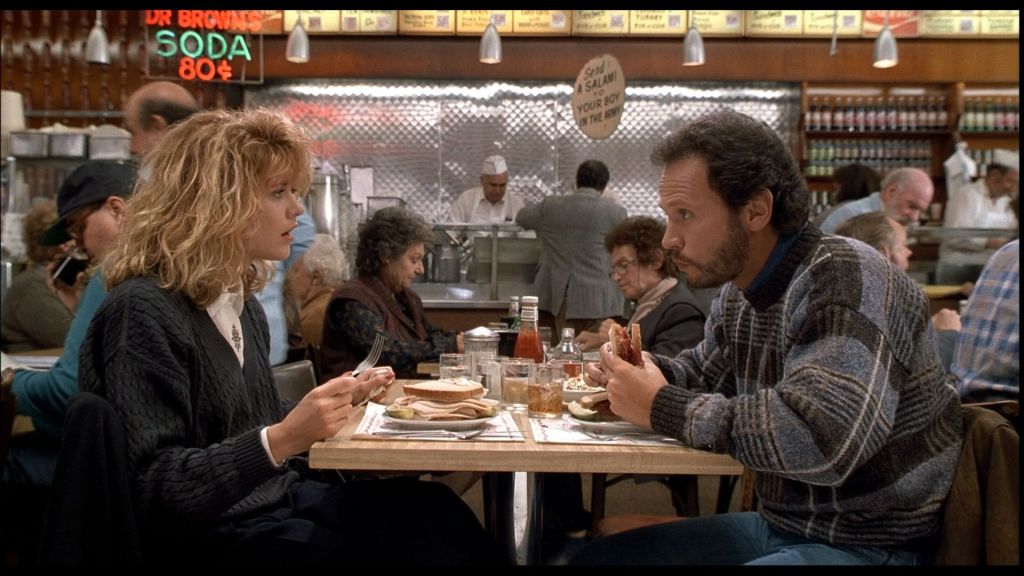La escena del orgasmo fingido de Meg Ryan es un clásico de la comedia romántica. - Imagen: Moviestore Shutterstock