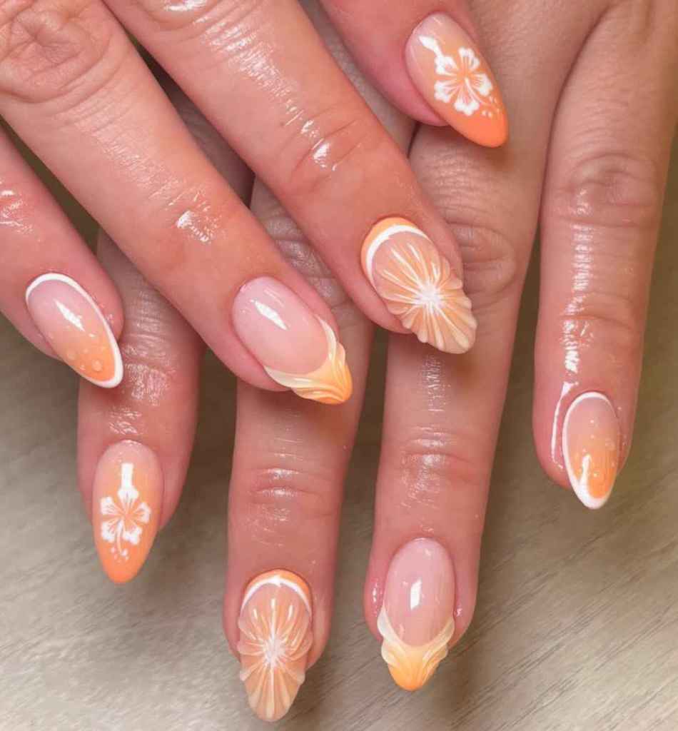 Las manicuras naranjas llaman a meterles detalles cítricos con nail art